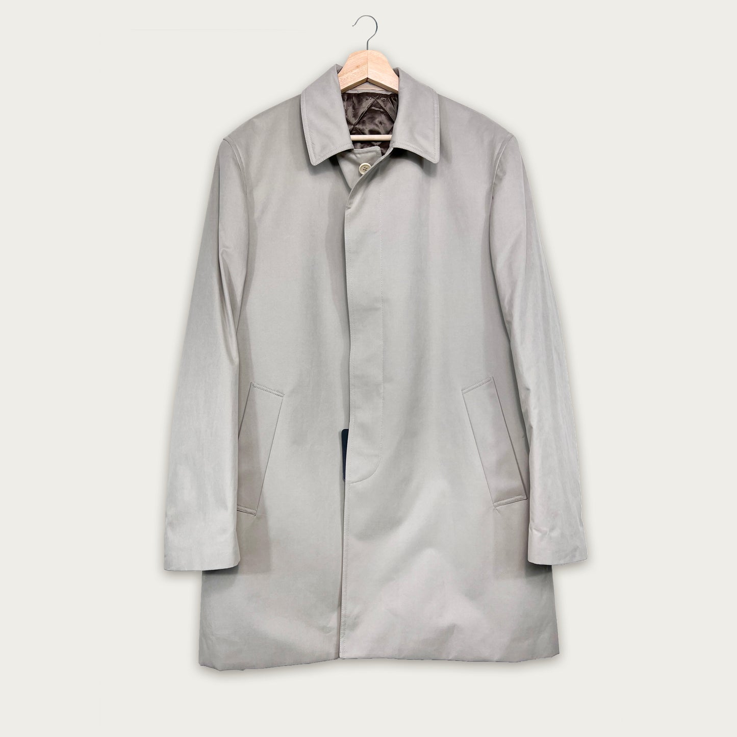 Trench coat with padded lining
