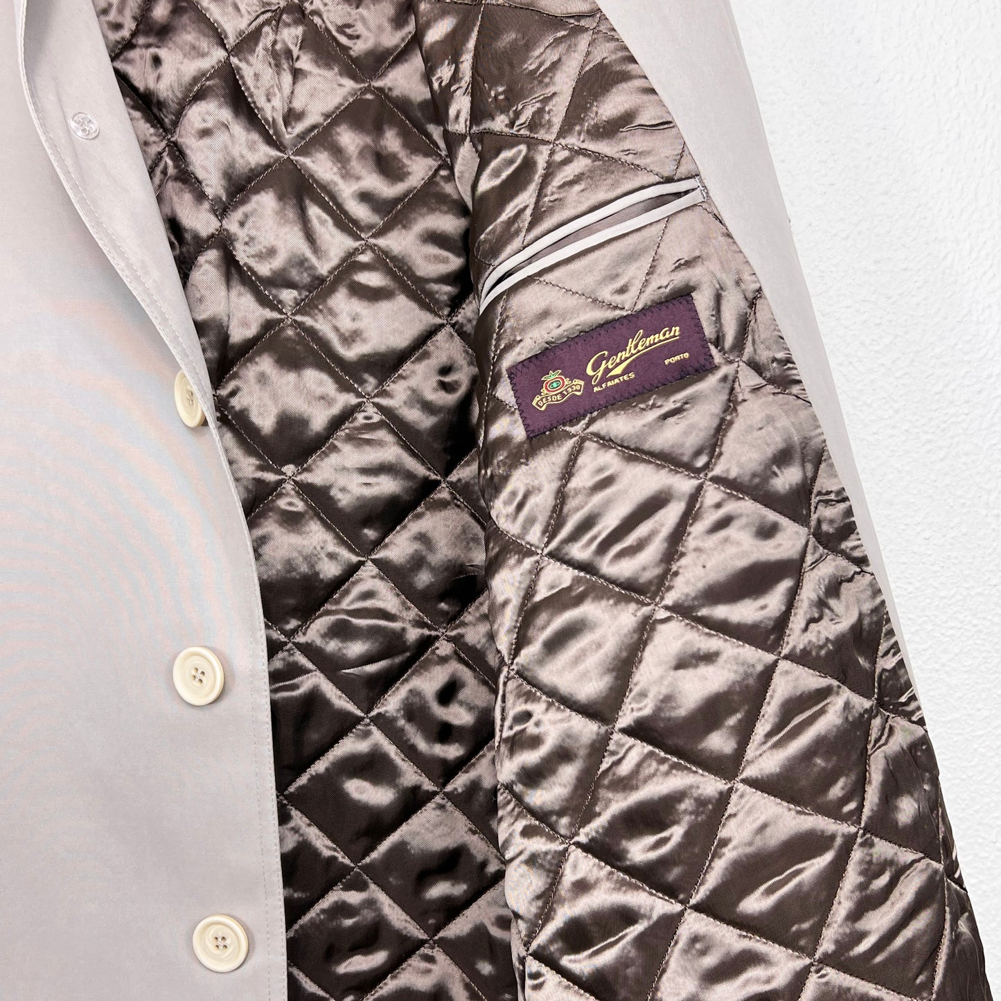 Trench coat with padded lining